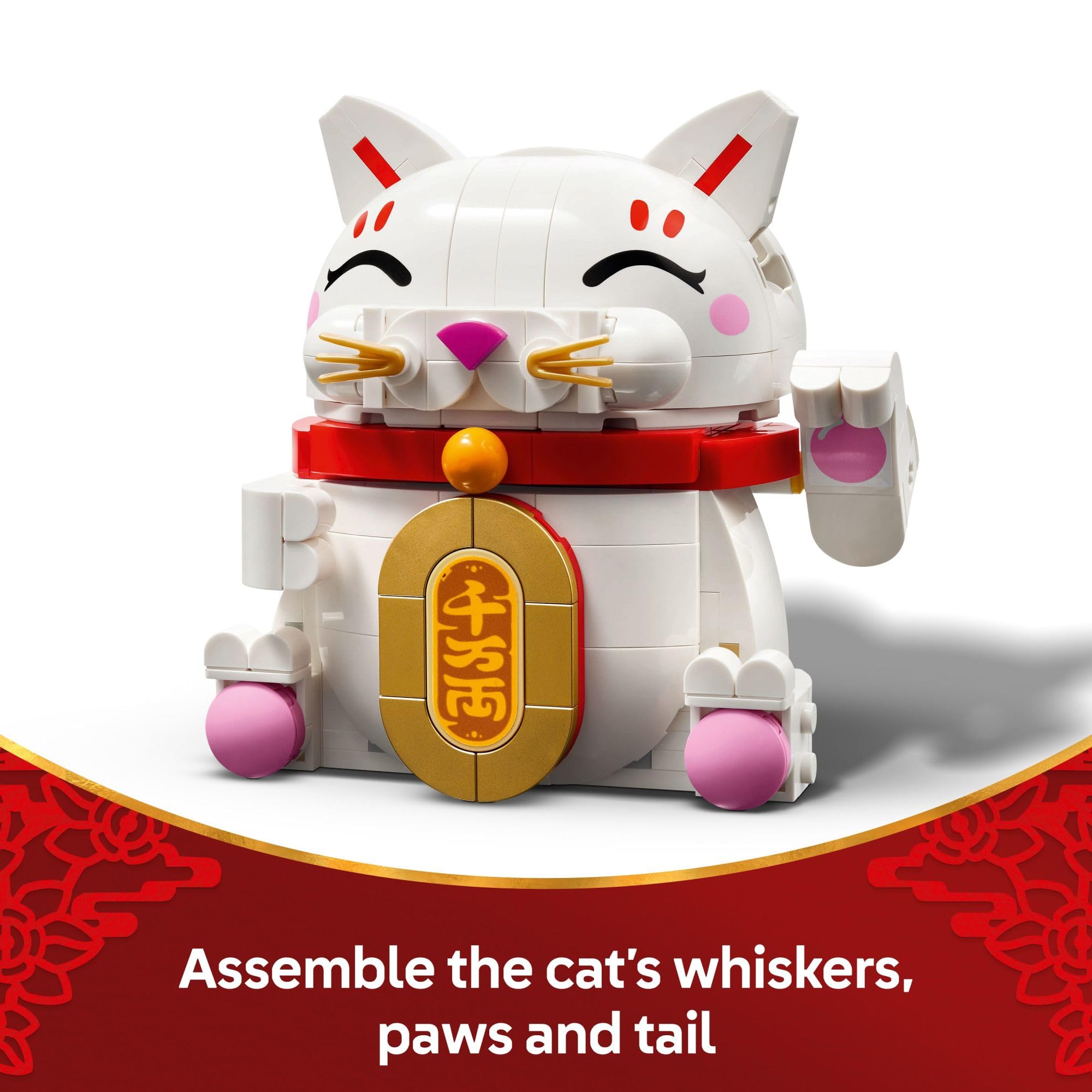 LEGO Lucky Cat comparación de tamaño junto a una regla para referencia de 11 cm
