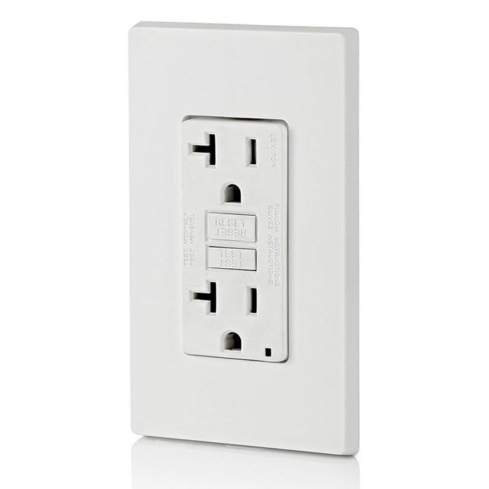 Leviton comparación de tamaño junto a una regla para escala, muestra diseño compacto