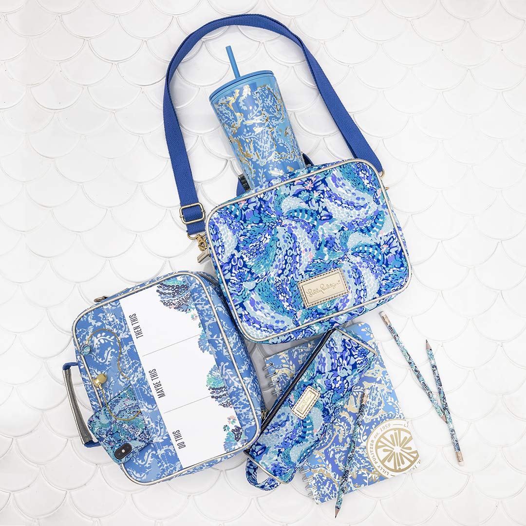 Lilly Pulitzer pouch en uso dentro de un bolso mostrando organización eficiente