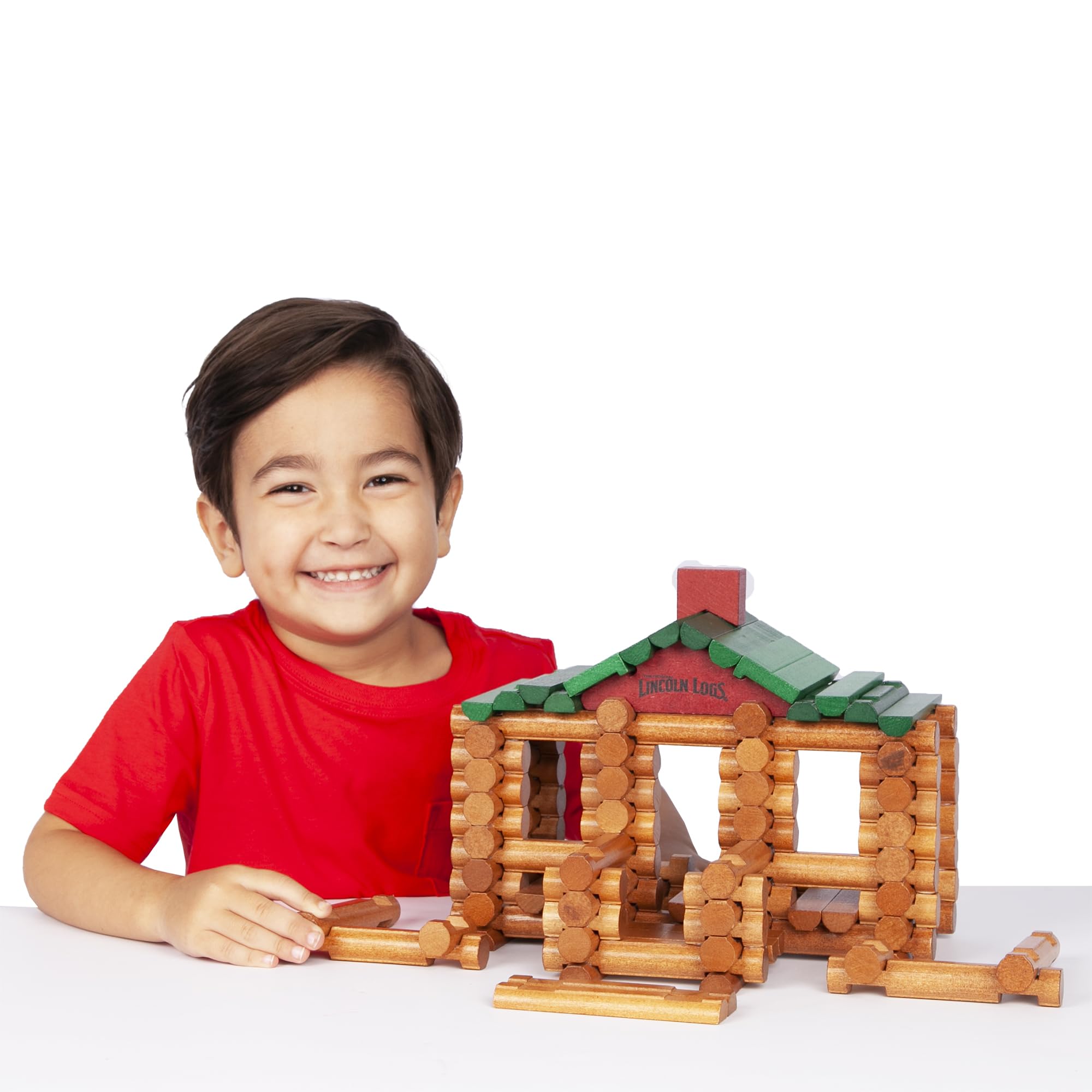 Lincoln Logs lata abierta con las 111 piezas guardadas para transporte y orden rápido