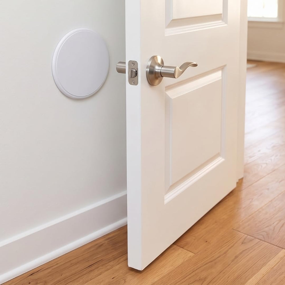 Litepak tope instalado detrás de pomo de puerta del baño evitando marcas