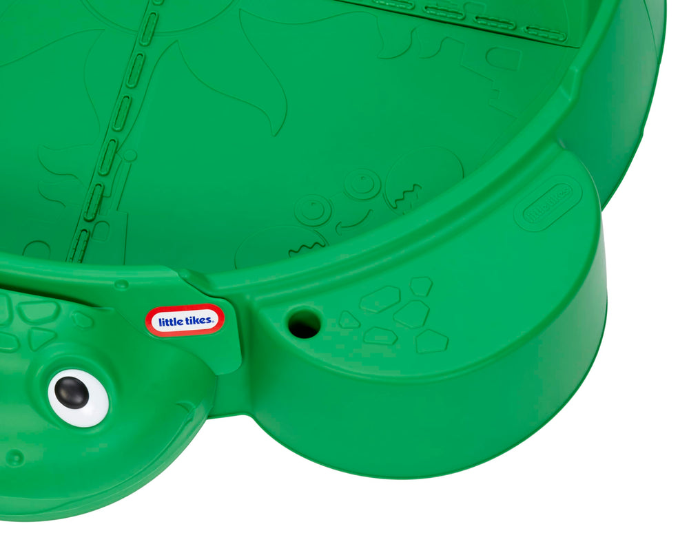 Little Tikes arenero en jardín con sombrilla, ideal para exteriores y protección solar