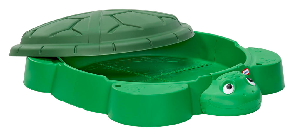 Little Tikes arenero junto a una regla para comparar tamaño y planificar ubicación