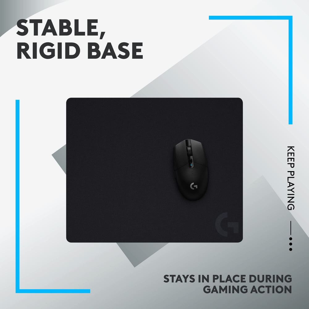 Logitech G440 comparación de tamaño junto a un teclado para escala