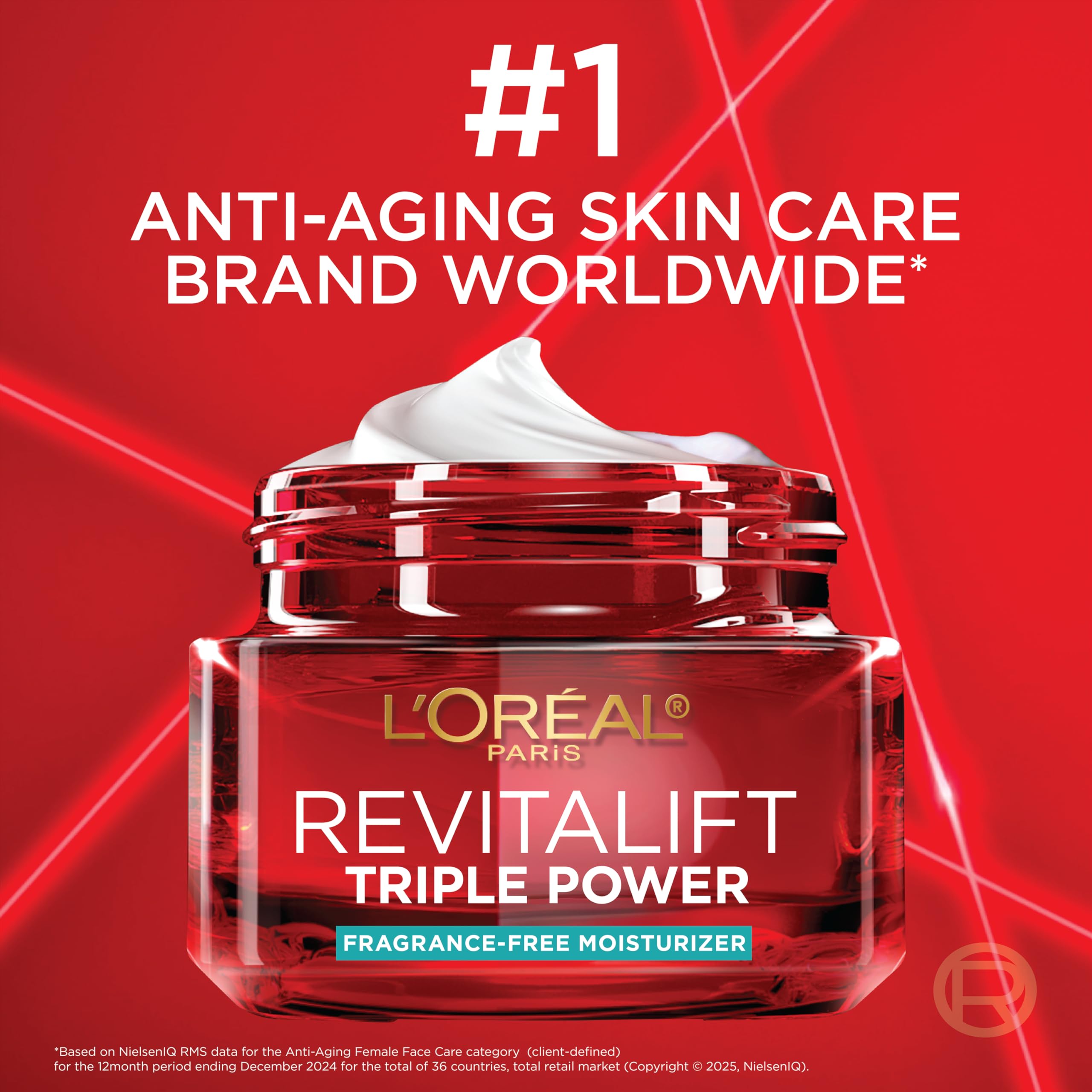 L'Oreal Paris applying moisturizer to face in morning routine for daily protection