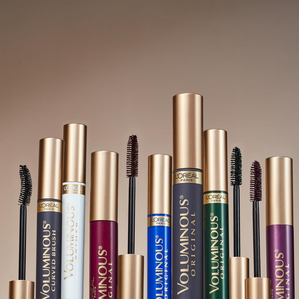 L'Oreal Paris envase al lado de una regla para ver el tamaño compacto y portátil