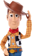 Mattel Woody junto a regla mostrando escala de 7 pulgadas precisa