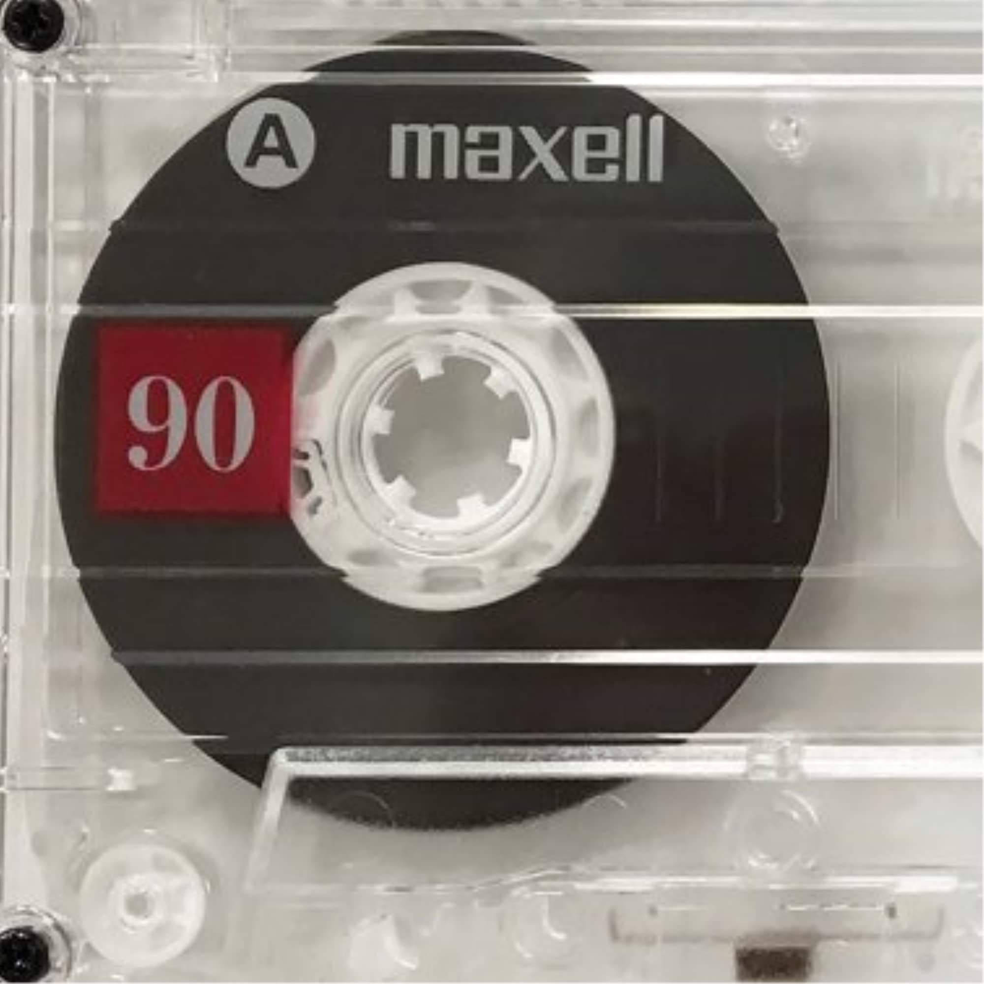 Maxell UR 90 detalle de cinta y carrete, superficie de bajo ruido y durabilidad