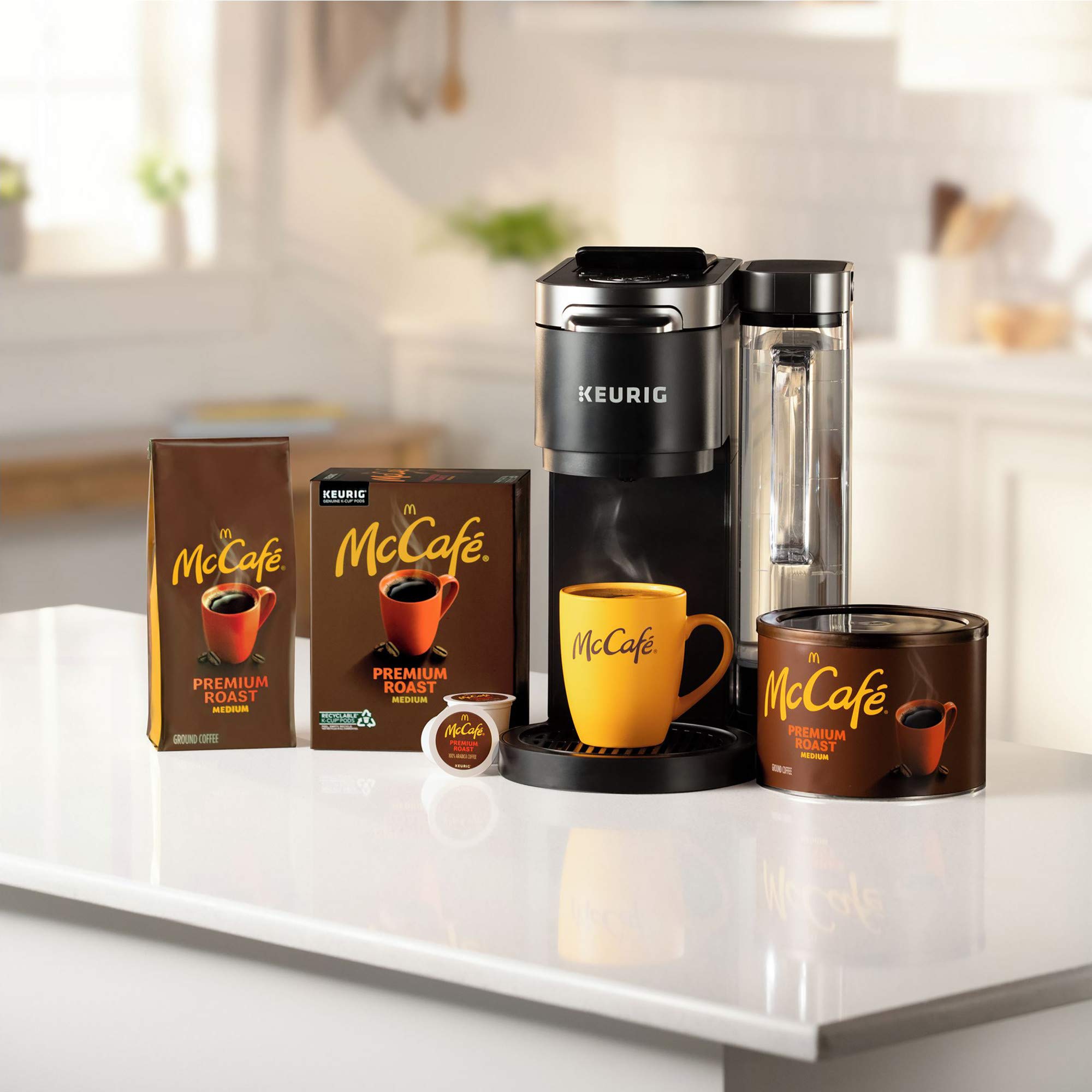 McCafé opened canister showing packed grounds and extended freshness benefit