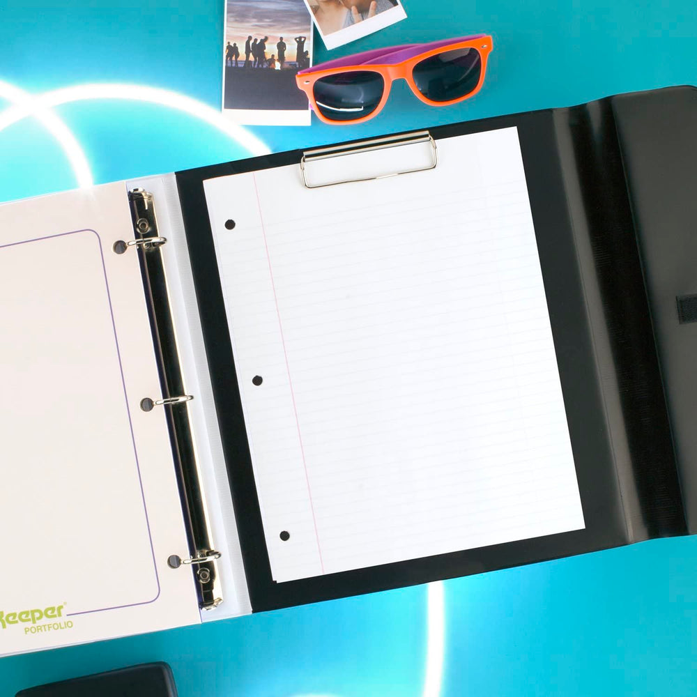 Mead Trapper Keeper clip metálico trasero sujetando papeles sueltos con firmeza