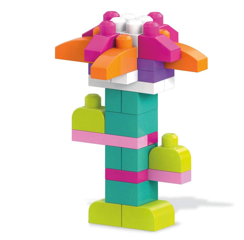 Mega Bloks bloque en mano pequeña demostrando agarre cómodo