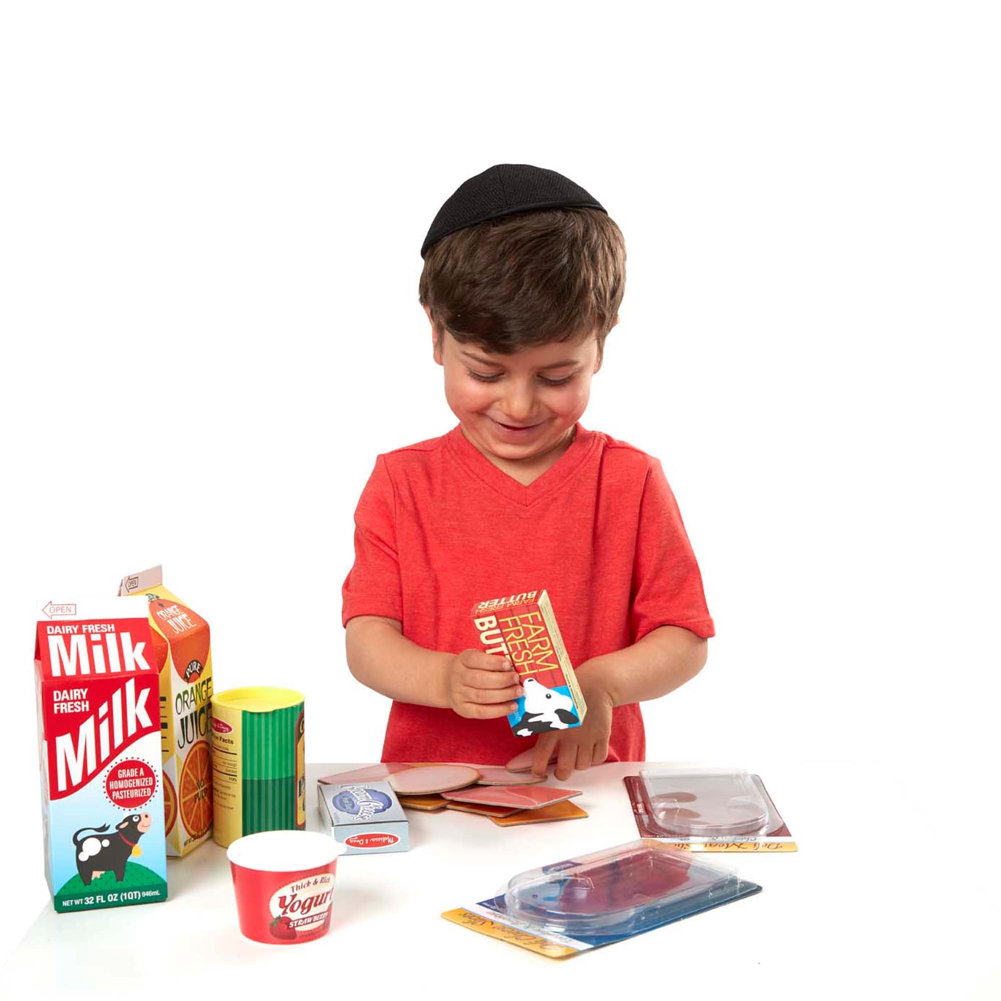 Melissa & Doug escena familiar usando el set para juego colaborativo