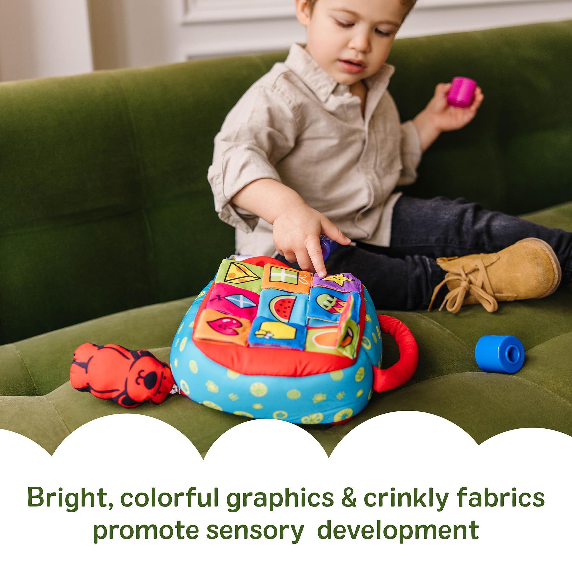 Melissa & Doug block dropping through sorter hole showing cause-and-effect learning benefit