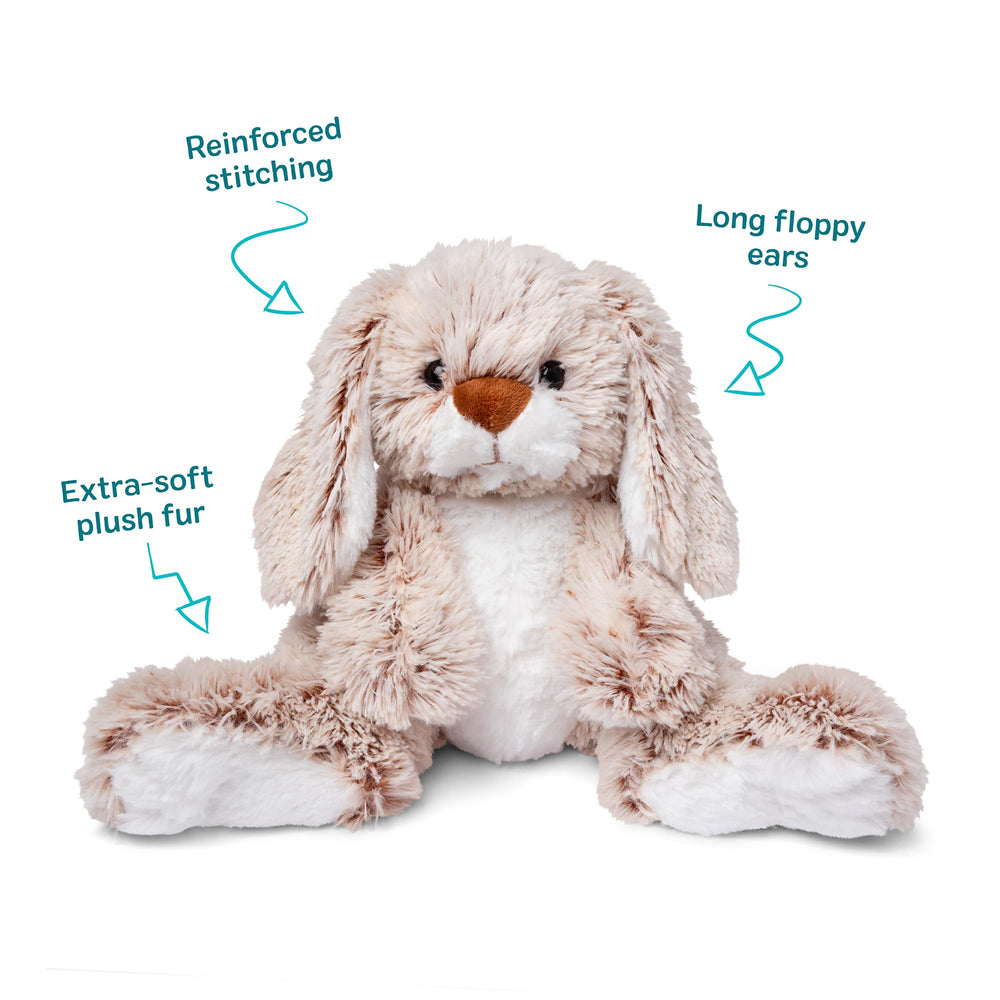 Melissa & Doug peluche junto a regla para comparar tamaño práctico