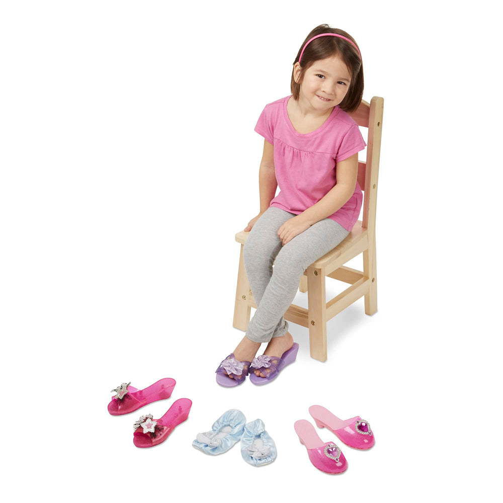 Melissa & Doug comparación de talla con mano que muestra escala real