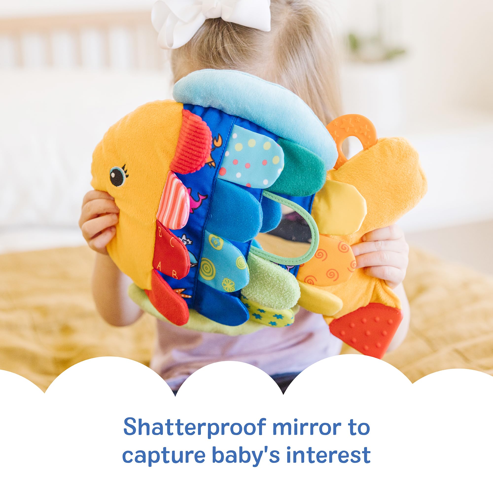 Melissa & Doug juguete en tummy time apoyando control de cuello