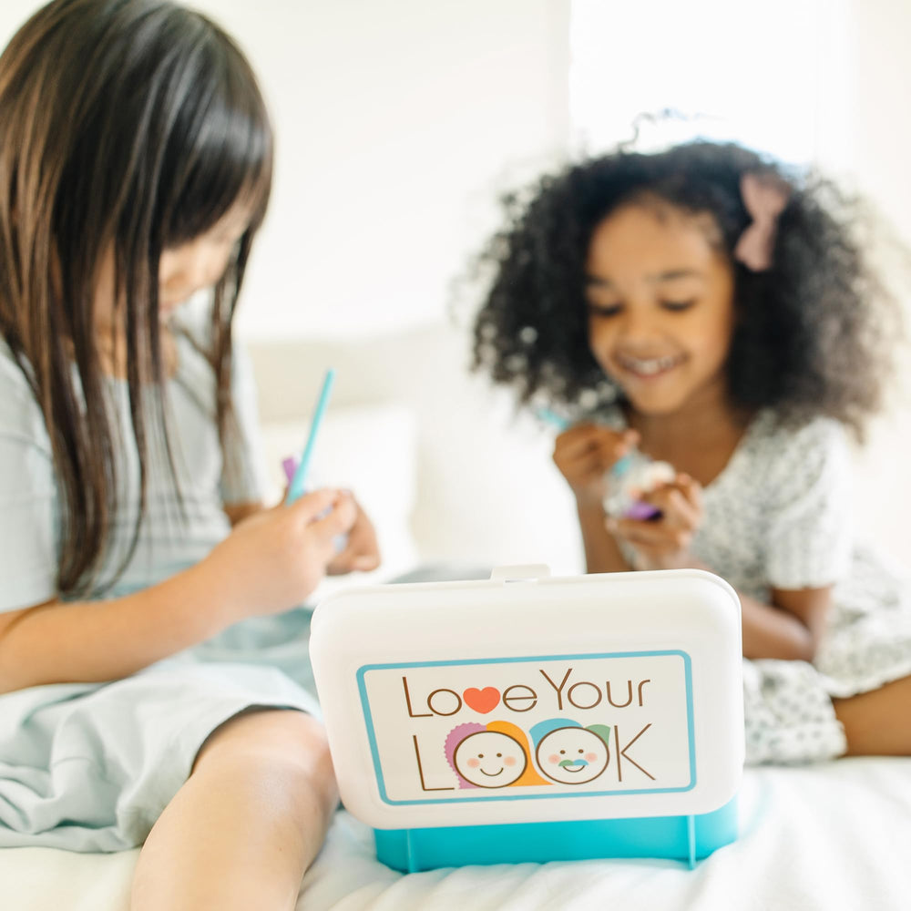 Melissa & Doug open makeup case with mirror demonstrating ready-to-play organization