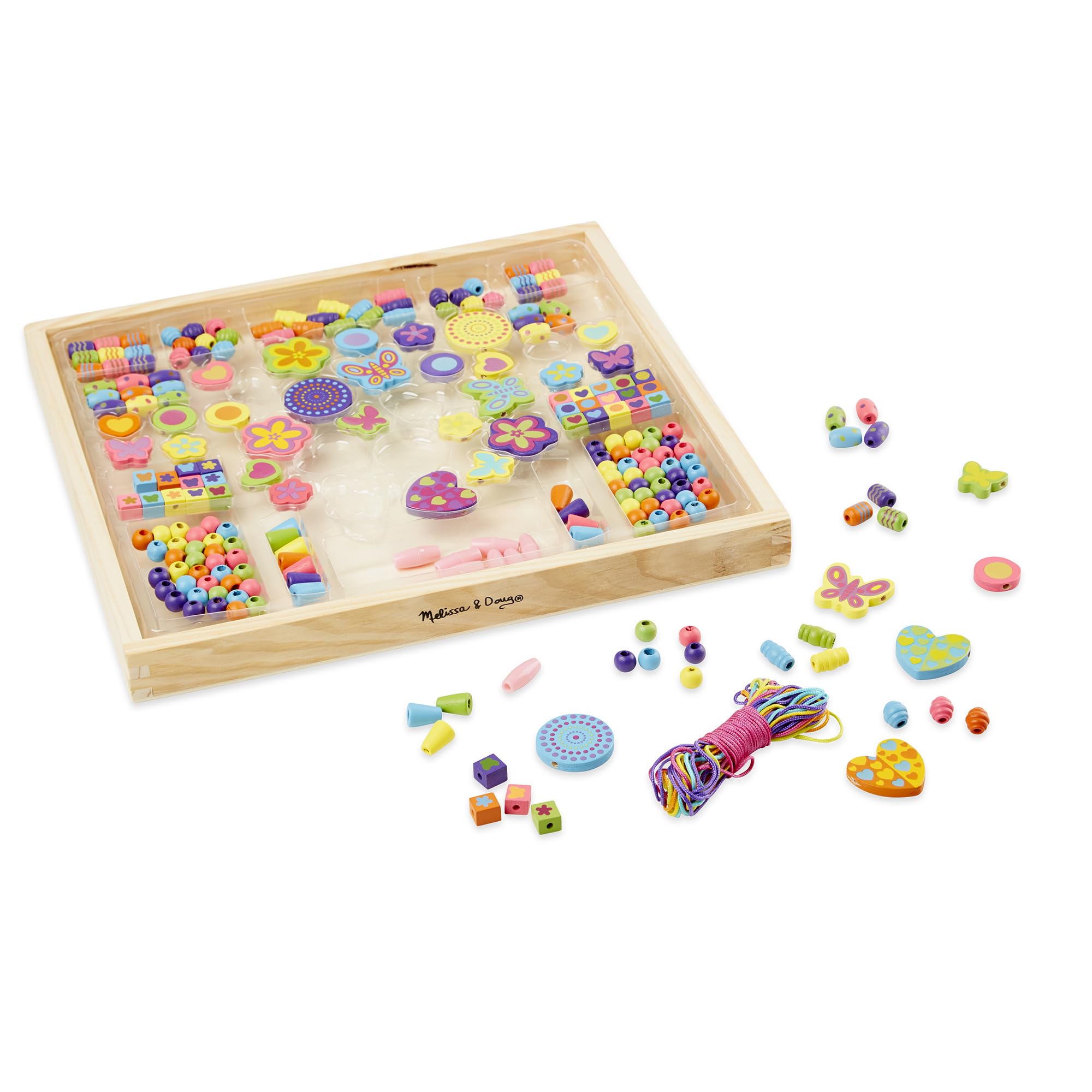 Melissa & Doug manos infantiles enhebrando cuentas que mejora motricidad fina
