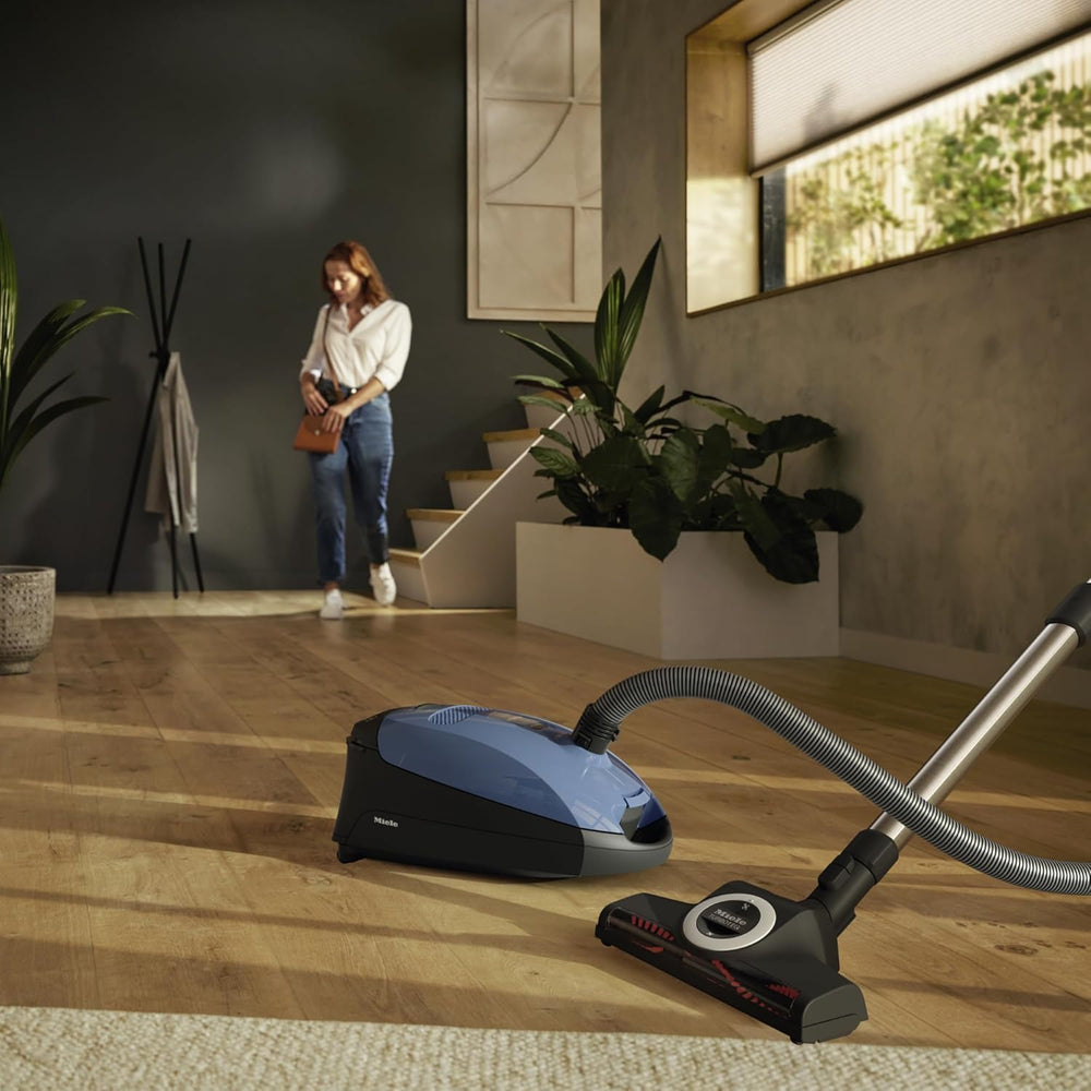 Miele almacenamiento con accesorios enganchados para orden y accesibilidad