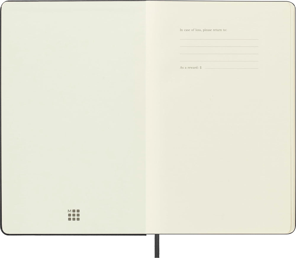 Moleskine abierto plano para dibujar a doble página con comodidad