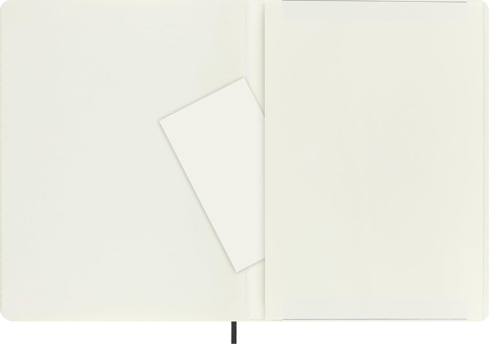Comparación de tamaño Moleskine junto a un bolígrafo, formato extra large práctico