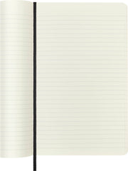 Cuaderno Moleskine en uso sobre escritorio con bolígrafo, favorece la productividad