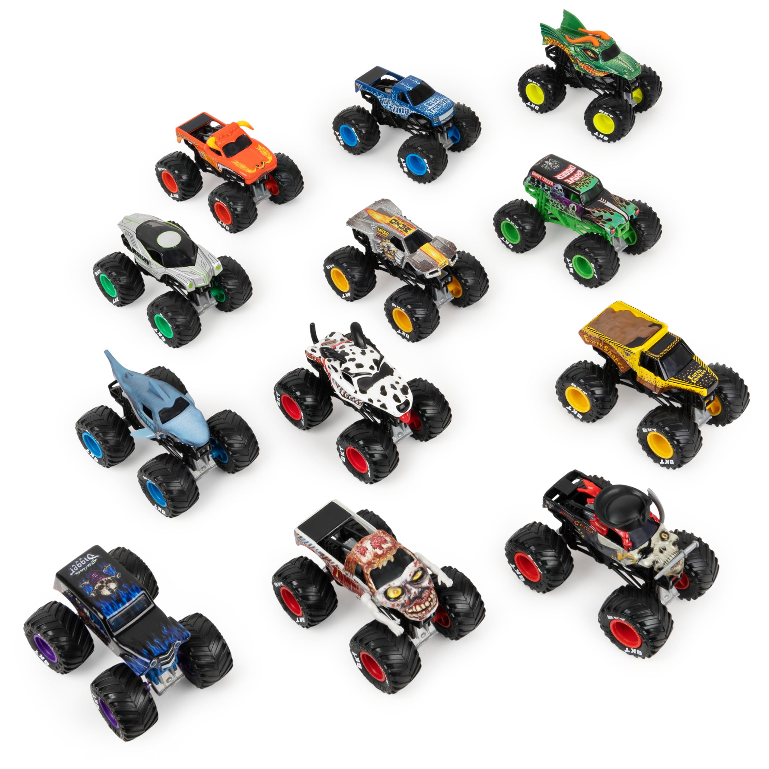 Monster Jam comparación de escala 1:64 junto a una mano para referencia de tamaño
