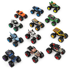Monster Jam comparación de escala 1:64 junto a una mano para referencia de tamaño