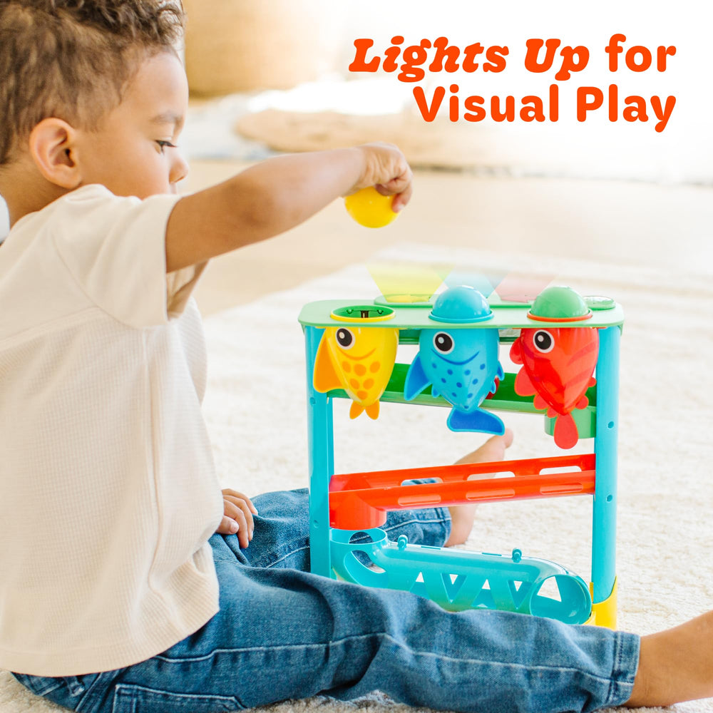Move2Play etiqueta con botones y leyenda de canciones, indica funciones educativas visibles