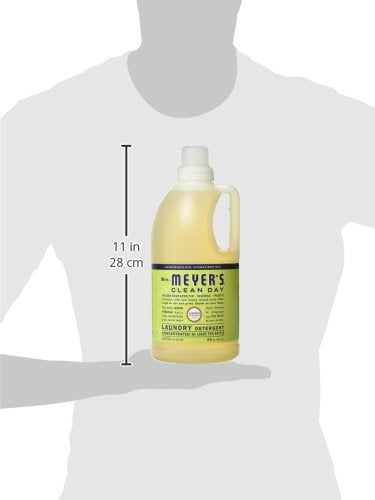 Mrs. MEYER'S vertiendo detergente en lavadora, uso sencillo y compatible con HE