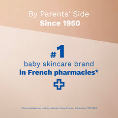 Mustela baby bath in use with parent washing infant hair and skin safely