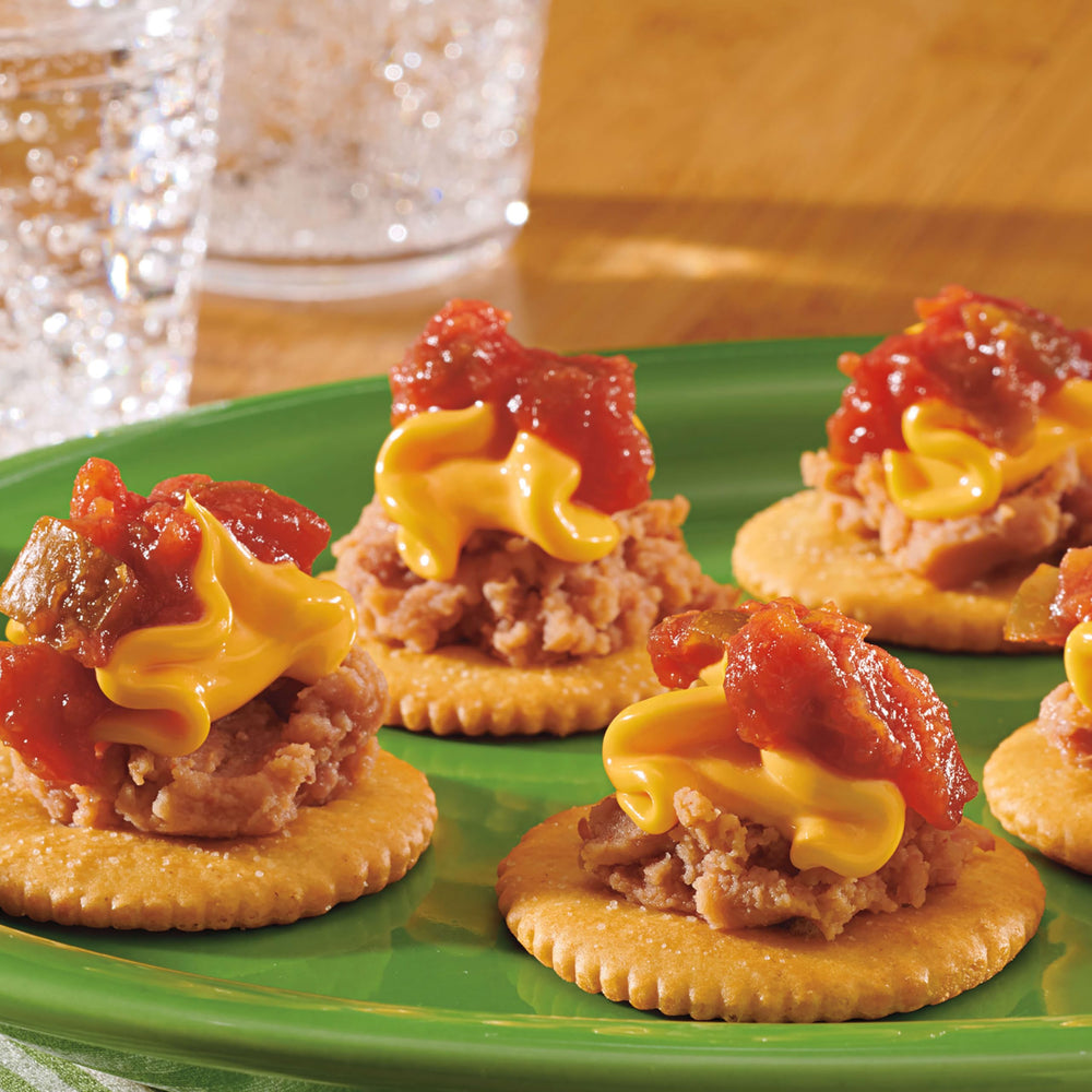NABISCO presentación en mesa con galletas y queso para reuniones