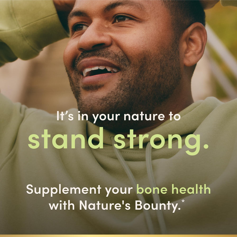 Nature's Bounty softgels junto a un plato sugerido para tomarlos con comida