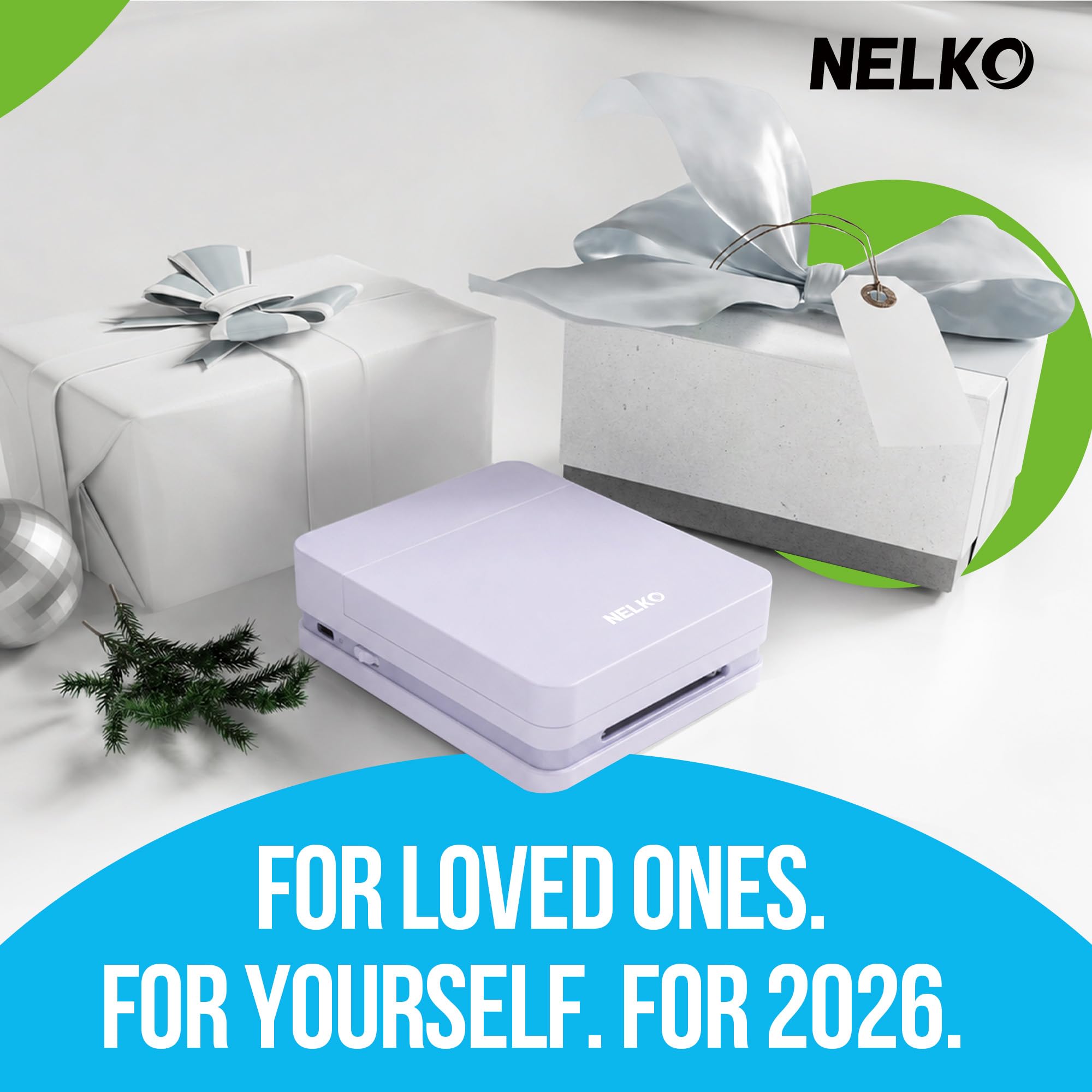 Nelko PP01 en mesa de fiesta con scrapbooks y regalos listos para pegar