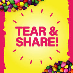 NERDS crunchy coating close-up highlighting colorful nibs and tangy flavor pop