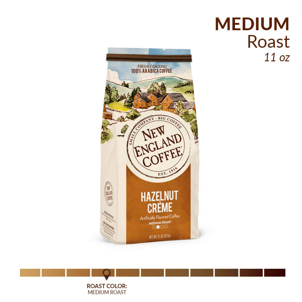 New England Coffee ground texture close-up showing medium grind and nutty aroma clarity