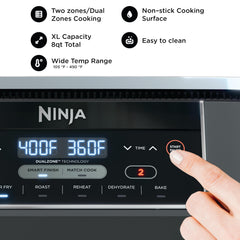 Ninja Foodi con ambas cestas abiertas para cocinar dos platos simultáneamente