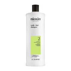 NIOXIN envase frontal mostrando diseño profesional y limpieza profunda