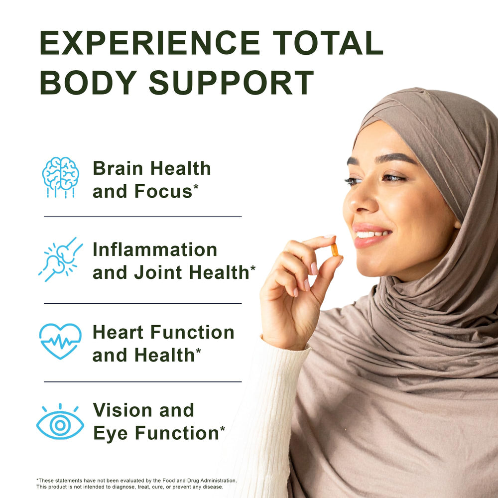 Noor Vitamins cápsula entre dedos para apreciar tamaño y dosificación