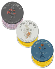 Norse Organics paquete frontal mostrando los tres productos y beneficio de rutina completa