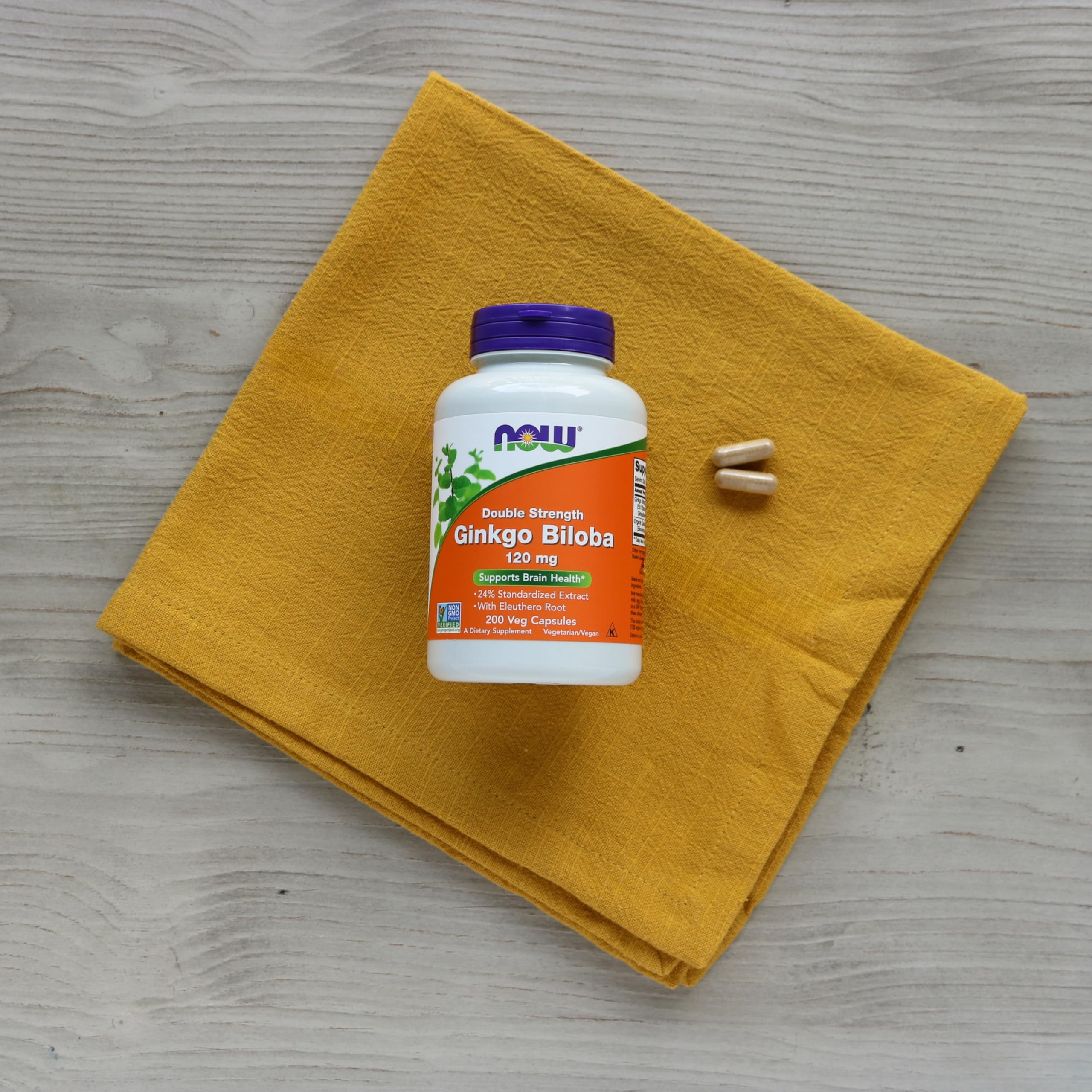 NOW Foods envase en cocina sobre mesa moderna, sugiere uso diario cómodo