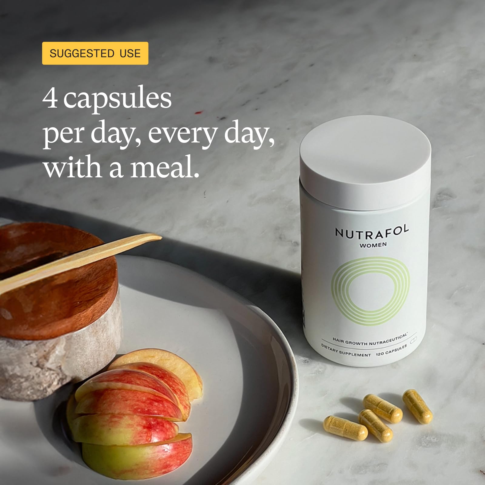 Nutrafol etiqueta en detalle resaltando ingredientes clave y dosis