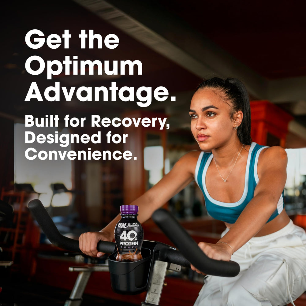 Optimum Nutrition botella junto a regla para comparar tamaño y facilitar transporte
