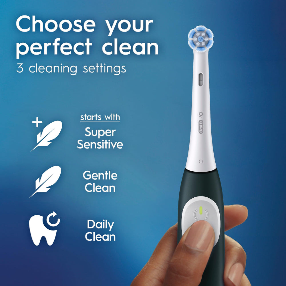 Oral-B two included brush heads displayed to show replacement readiness and hygiene