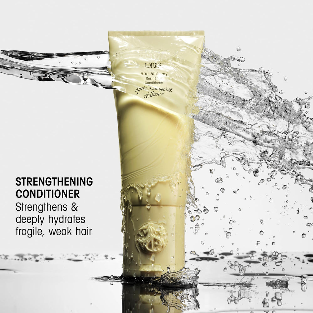 Etiqueta trasera Oribe Hair Alchemy mostrando ingredientes y beneficios claros