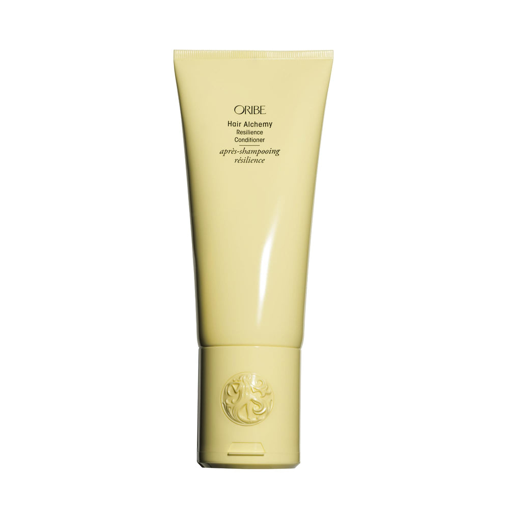 Envase frontal Oribe Hair Alchemy con diseño elegante y beneficio hidratación