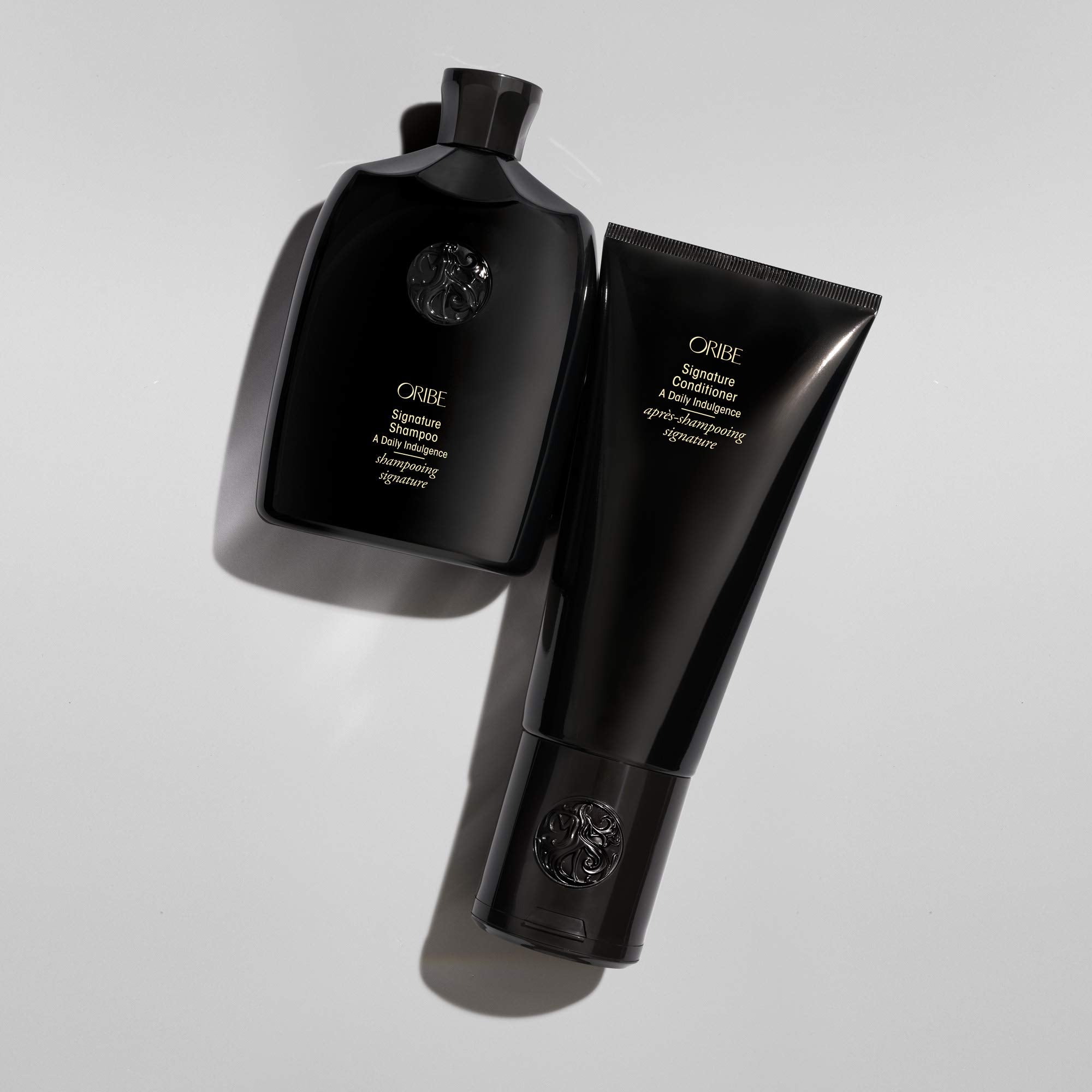 Oribe acondicionador comparación de tamaño 200 ml práctico viaje