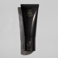 Oribe acondicionador etiqueta detalle ingredientes y beneficios