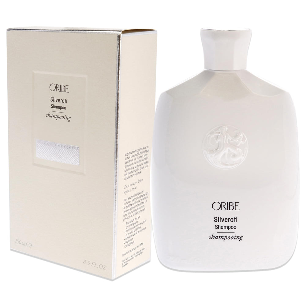 Oribe Silverati en uso en ducha aplicando espuma para matizar cabellos