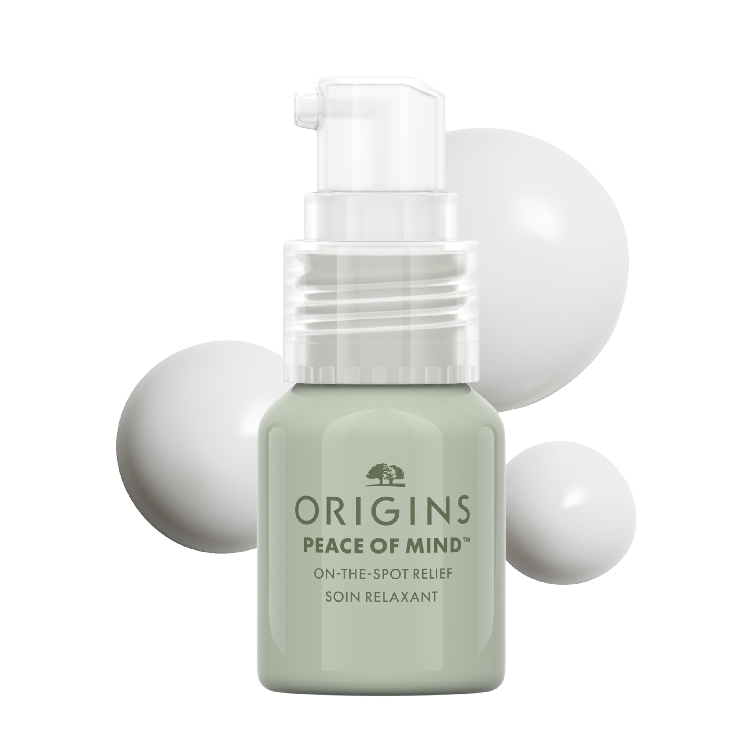 Origins envase frontal mostrando el diseño compacto y fácil de llevar
